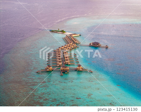 Aerial views of Velavaru Island at sunset in Maldives Aerial views of Velavaru Island at sunset in Maldives 123415130