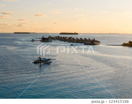 Aerial views of Velavaru Island at sunset in Maldives Aerial views of Velavaru Island at sunset in Maldives 123415198