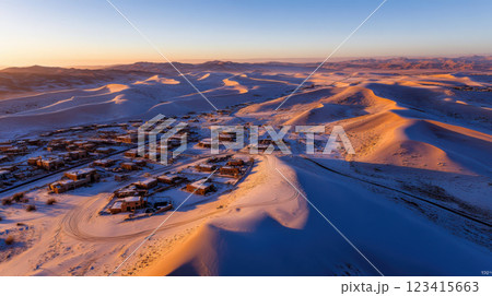 desert town blanketed in snow, showcasing stunning contrast of landscapes desert town blanketed in snow, showcasing stunning contrast of landscapes 123415663