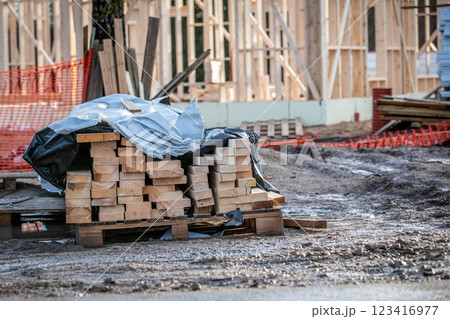 Wooden building materials on a wooden pallet at a construction site 123416977