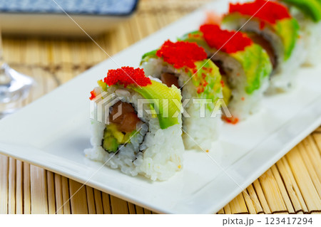 Uramaki with tobico topping Uramaki with tobico topping 123417294