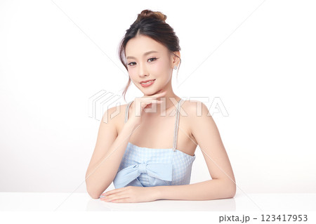 Beautiful young asian woman with clean fresh skin on white background, Face care, Facial treatment, Cosmetology, beauty and spa, Asian women portrait. Beautiful young asian woman with clean fresh skin on white background, Face care, Facial treatment, Cosmetology, beauty and spa, Asian women portrait. 123417953