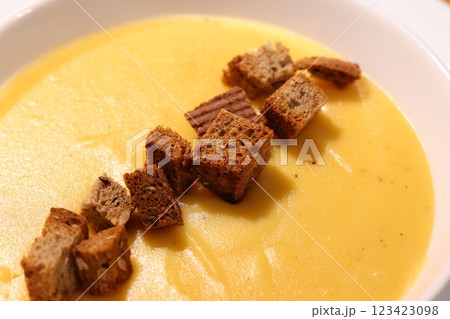 Enjoy the creamy Rich Pumpkin Soup with Crunchy Croutons, ideal for gatherings and festivities Enjoy the creamy Rich Pumpkin Soup with Crunchy Croutons, ideal for gatherings and festivities 123423098