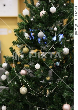 Beautiful and Elegant Christmas Tree Decor Featuring Ornaments, Tinsel, and Lights Galore Beautiful and Elegant Christmas Tree Decor Featuring Ornaments, Tinsel, and Lights Galore 123423118