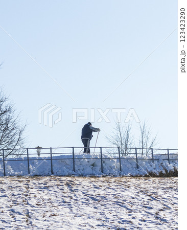 People enjoying skiing outdoors on sunny but cold weather. Activities 123423290