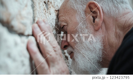 Spiritual connection: Western Wall prayers, sacred tradition, religious devotion, peaceful worship, ancient site, spiritual reflection, Jewish faith, holy place, unity in prayer, sacred moment. Spiritual connection: Western Wall prayers, sacred tradition, religious devotion, peaceful worship, ancient site, spiritual reflection, Jewish faith, holy place, unity in prayer, sacred moment. 123423795