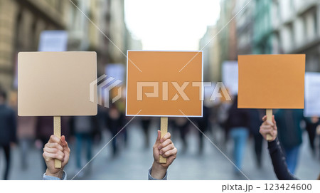 Public Protest Demonstration with People Holding Blank Signs in Urban Environment 123424600