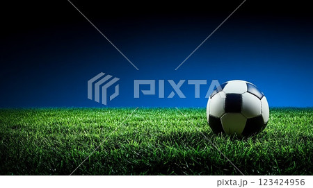 Blue and Green Gradient Background with Football on Grass Field for Sports Theme 123424956