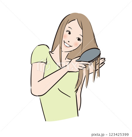 髪のブラッシングを入念にする美しい女性 123425399