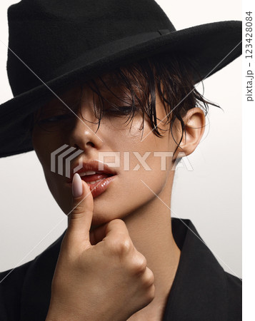 close-up portrait of Beautiful passion young woman in hat close-up portrait of Beautiful passion young woman in hat 123428084