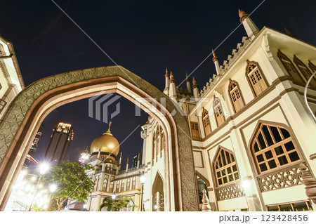 Building view of the Sultan Mosque and Bussorah Street in Kampong Glam, Singapore, there are many exotic Middle Eastern restaurants, handicrafts, and homeware shops here. Building view of the Sultan Mosque and Bussorah Street in Kampong Glam, Singapore, there are many exotic Middle Eastern restaurants, handicrafts, and homeware shops here. 123428456