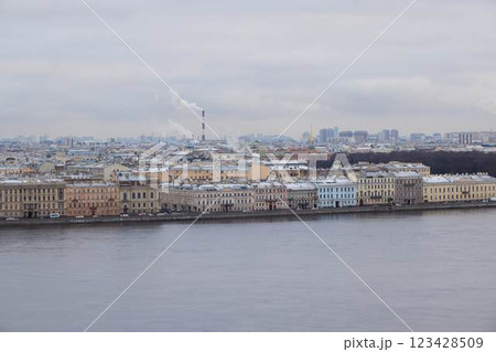 A picturesque winter scene featuring the historic riverfront of St. Petersburg, showcasing A picturesque winter scene featuring the historic riverfront of St. Petersburg, showcasing 123428509