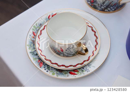 Beautifully crafted Elegant Porcelain Teacup and Saucer Set adorned with a Floral Design 123428580