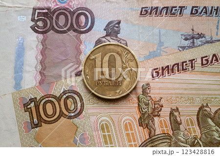 Russian ruble coin and banknotes 123428816