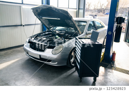 Car repair in car service Car repair in car service 123428923
