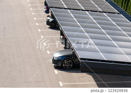 Parking space with solar panels on a roof. Solar canopy 123428936