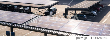 Parking space with solar panels on a roof. Solar canopy 123428940