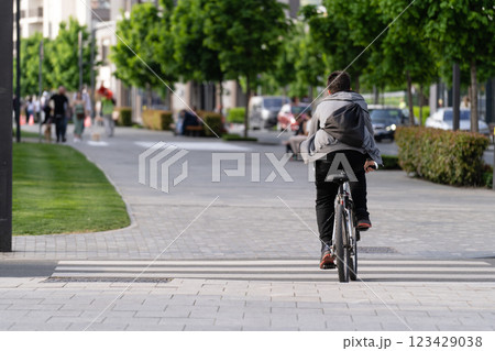 Cyclist rides a bicycle 123429038
