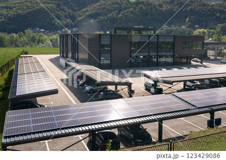 Parking space with solar panels on a roof. Solar canopy 123429086