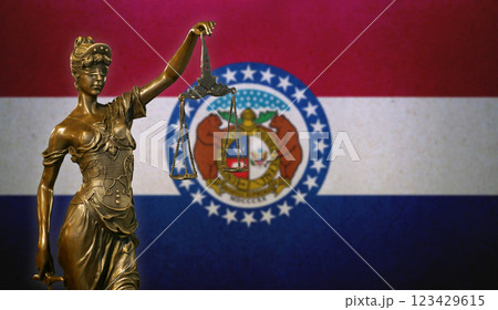 Lady Justice before a flag of Missouri Lady Justice before a flag of Missouri 123429615