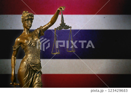 Lady Justice before a flag of Thailand Lady Justice before a flag of Thailand 123429683