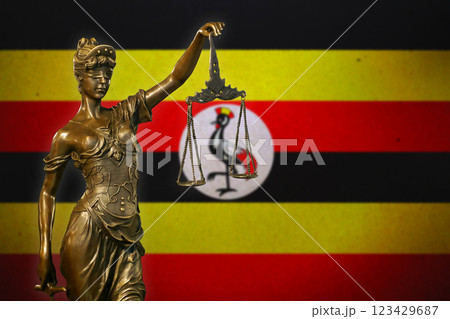 Lady Justice before a flag of Uganda Lady Justice before a flag of Uganda 123429687