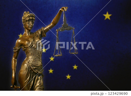 Lady Justice before a flag of Alaska Lady Justice before a flag of Alaska 123429690