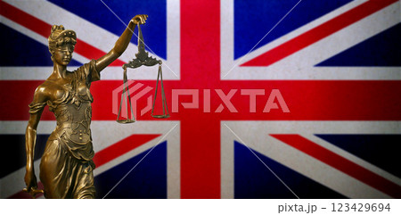 Lady Justice before a flag of the United Kingdom 123429694
