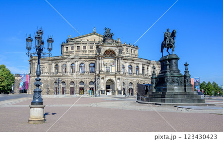 King Johann of Saxony monument and Semperoper opera house on the Theaterplatz square in the historic centre of Dresden, Germany King Johann of Saxony monument and Semperoper opera house on the Theaterplatz square in the historic centre of Dresden, Germany 123430423