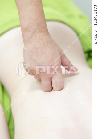 Caucasian woman on manual back massage. Caucasian woman on manual back massage. 123431173