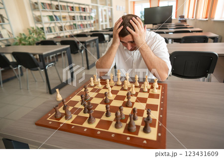 Portrait Caucasian man playing chess. Portrait Caucasian man playing chess. 123431609