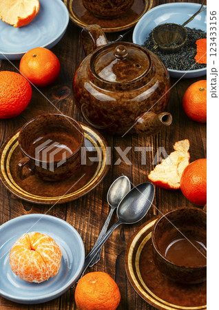 Mandarin tea in glass teapot or kettle. 123433156