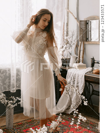 Gorgeous woman in vintage pastel dress. Spring tine fashion beauty concept 123433571