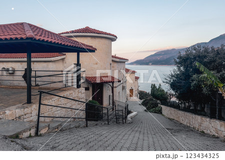View of a beautiful stone building in Kas after sunset. View of a beautiful stone building in Kas after sunset. 123434325