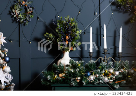 Christmas decor on the top of a green piano. New Year's items in the room 123434423