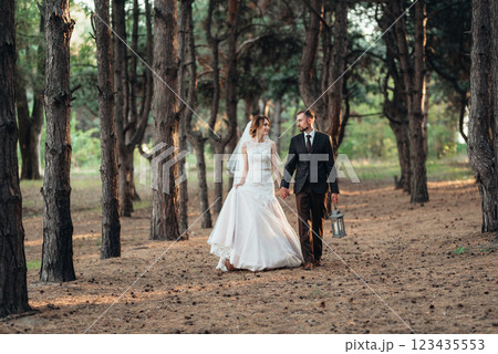 walk of the bride and groom through the autumn forest walk of the bride and groom through the autumn forest 123435553