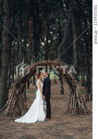 walk of the bride and groom through the autumn forest walk of the bride and groom through the autumn forest 123435581