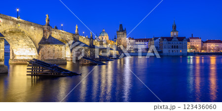 Panoramic night view of the iconic Charles Bridge over Vltava river and Prague Old town cityscape, in Prague, Czech Republic Panoramic night view of the iconic Charles Bridge over Vltava river and Prague Old town cityscape, in Prague, Czech Republic 123436060