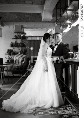 bride and groom inside a cocktail bar 123436787