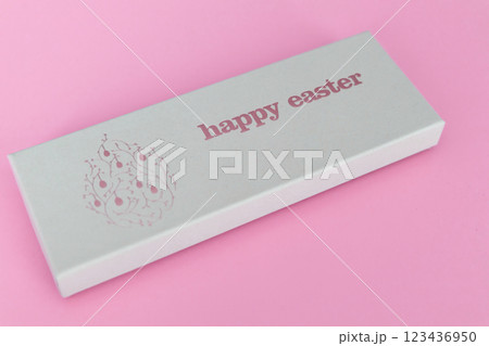 A box of chocolate eggs with the inscription in English Happy Easter. A box of chocolate eggs with the inscription in English Happy Easter. 123436950