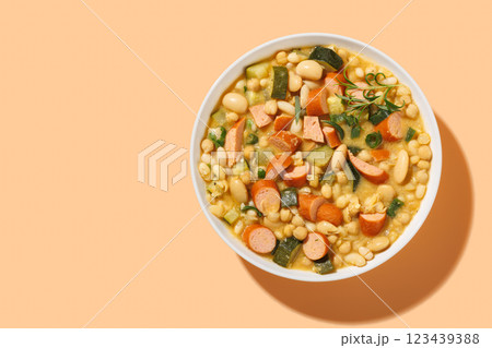 white bean chickpea chili with sausages, zucchini 123439388