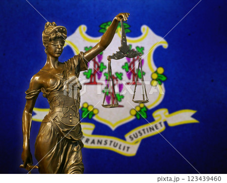 Lady Justice before a flag of Connecticut Lady Justice before a flag of Connecticut 123439460