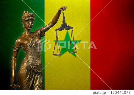 Lady Justice before a flag of Senegal 123441078