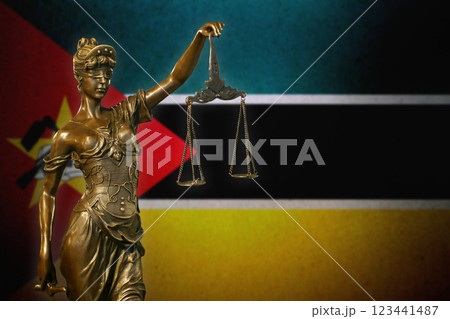 Lady Justice before a flag of Mozambique Lady Justice before a flag of Mozambique 123441487