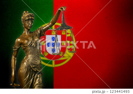 Lady Justice before a Portuguese flag 123441493