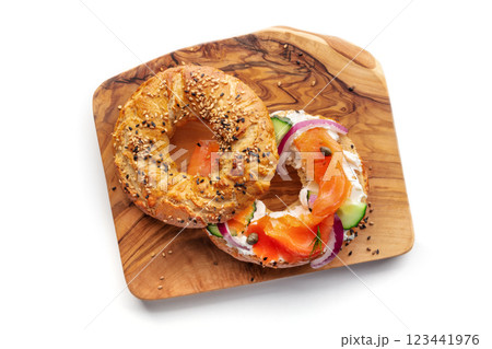 Lox bagel. A sandwich with smoked salmon and fresh vegetables 123441976