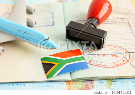South Africa passport with approved stamp on document for tourism to immigration at airport in country. 123442101