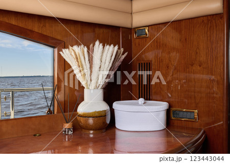 Enjoy the experience of elegant and refined interior decor within a stunning luxury yacht setting 123443044