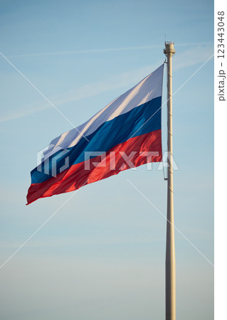 A Beautiful Image of the Russian Flag Waving Gracefully Against a Clear Blue Sky A Beautiful Image of the Russian Flag Waving Gracefully Against a Clear Blue Sky 123443048