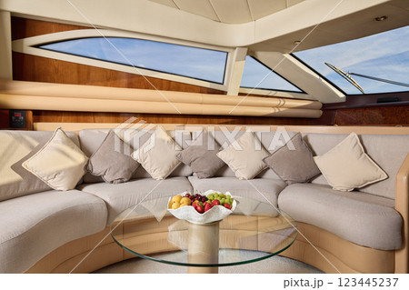 The Elegant Yacht Interior Features Cozy Seatings and an Abundance of Fresh Fruit 123445237